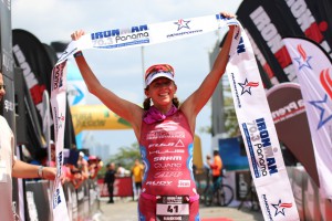 Sarah Haskins is shown crossing the finish line as she places first among women during the IRONMAN 70.3 Pan American Pro Championship in Panama. Photo: Copyright Kortuem Inc. 2016 